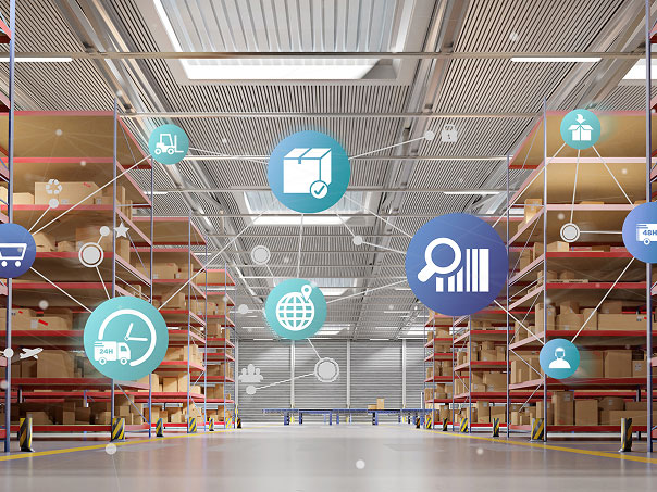 Warehouse interior with logistics icons suspended from ceiling, representing supply chain and distribution.